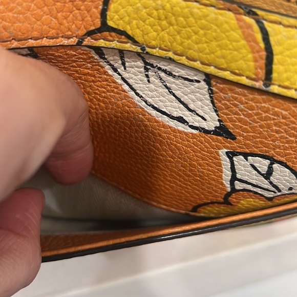 Tory Burch camera bag crafted of leather with floral motif. - Picture 11 of 17